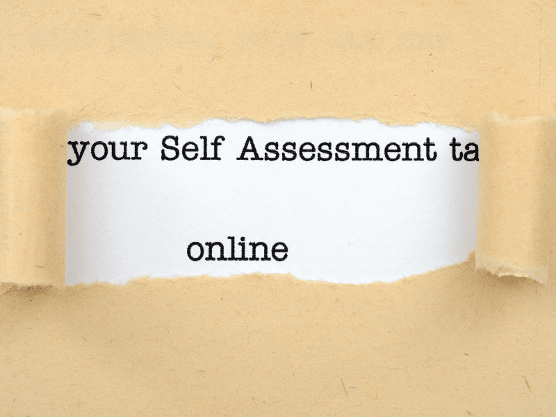 Self assessment tax return 2023/24 - a ripped piece of paper with the words your Self Assessment tax online underneath