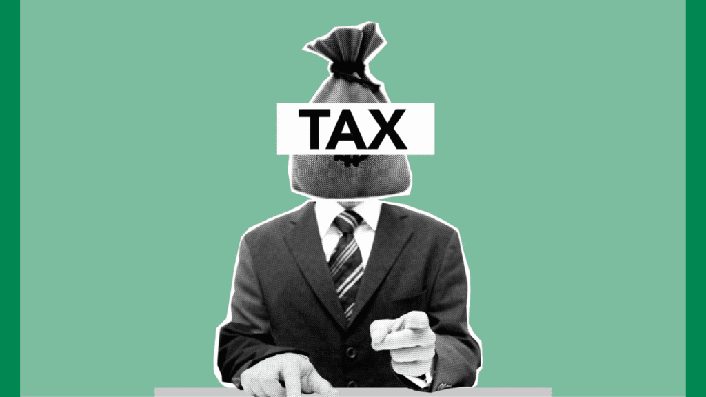 Man with a money bag for a head with Tax written over the top pointing at the screen. Making tax digital ITSA is coming soon.