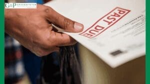 late payment legislation for past due invoices. hand holding an invoice stamped 'past due'