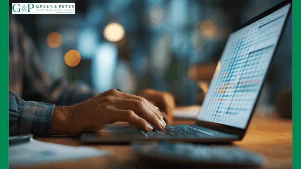 Hands on a laptop filing accounts with Companies House