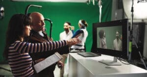creative team reviewing production footage in studio, representing creative industry accountants for north london businesses.